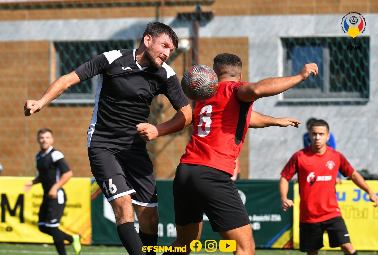 FC Red Devils player competing in a red shirt featuring the 69 Media sponsor logo